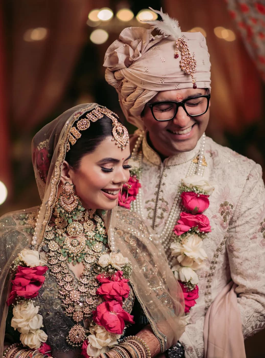 Couple in marigold garlands