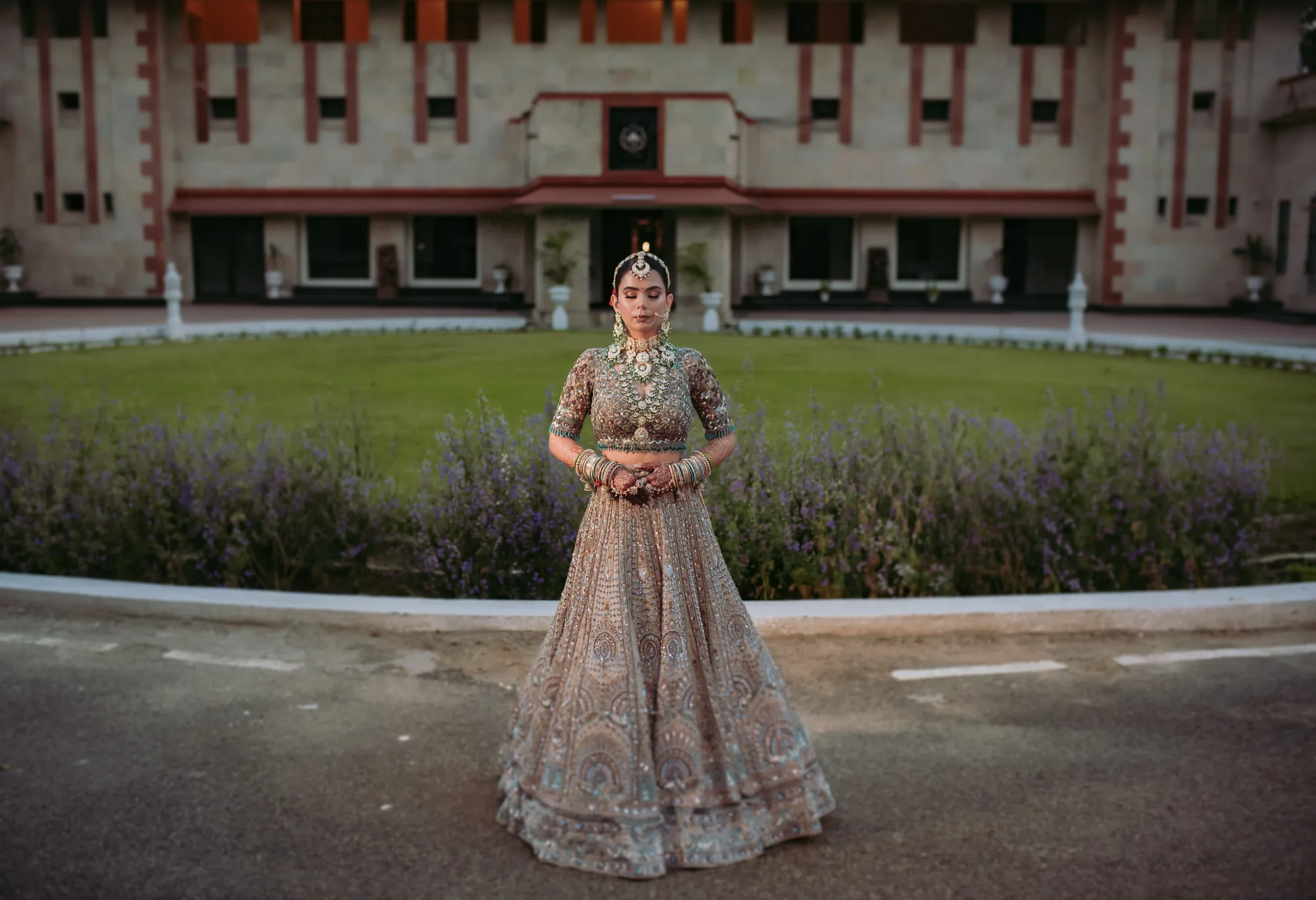 Bride in a heritage palace courtyard